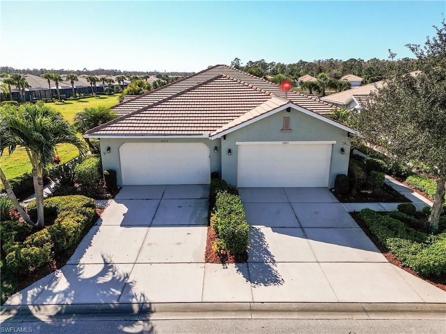 This stunning WCI-built Areca model offers an extended great room for extra living space, along with a covered lanai and spacious screened-in paver patio, and is being sold turnkey for a simple, carefree move. The versatile flex room can serve as a third bedroom, home office, craft space, or media room. Located in the Materita neighborhood of Pelican Preserve, a nationally recognized 55+ resort-style gated community, this beautifully maintained home sits on a scenic 3-acre lake with over 450 feet of open water views along Sirene Way—perfect for enjoying morning coffee or hosting friends and family. The Areca layout features a roomy kitchen with a casual dining nook, raised breakfast bar, and formal dining area, enhanced by 42-inch cabinets, granite countertops, and a pantry. Snowbirds will love the easy-to-use Storm Smart accordion shutters and electric roll-down for the lanai, making seasonal security a breeze and the 2' garage extension provide additional storage room for bikes, clubs or your personal golf cart. The HOA covers lawn care, landscaping, roof cleaning, and exterior paint. The AC system and water heater were replaced in 2023. Pelican Preserve’s town center offers a vibrant hub with an indoor aquatic sports pool and walking track, two outdoor pools, fitness and wellness centers, tennis and pickleball courts, arts and craft rooms, a library, coffee bar, special interest clubs, a 99-seat cinema, on-site restaurants with outdoor seating, live entertainment, a concert pavilion, and miles of walking and biking trails. Optional golf memberships are available for those who enjoy hitting the links.