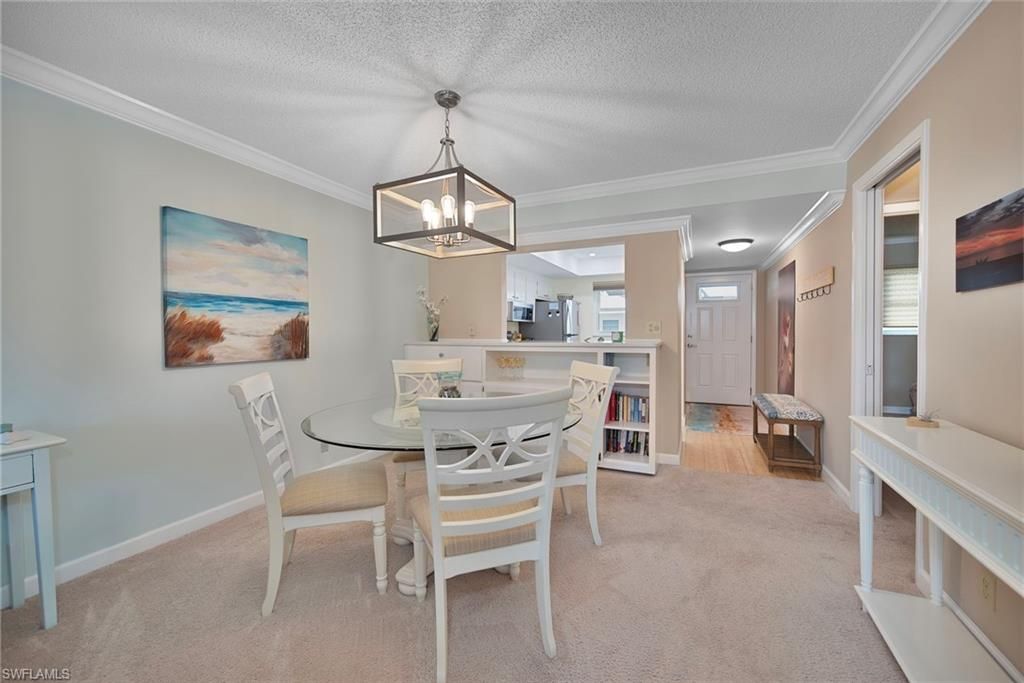 Photo of 3150 Binnacle DR #207, NAPLES, FL 34103 (MLS # 225079229)