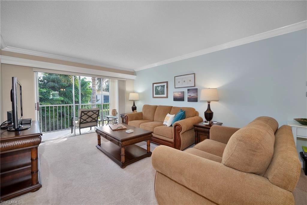 Photo of 3150 Binnacle DR #207, NAPLES, FL 34103 (MLS # 225079229)