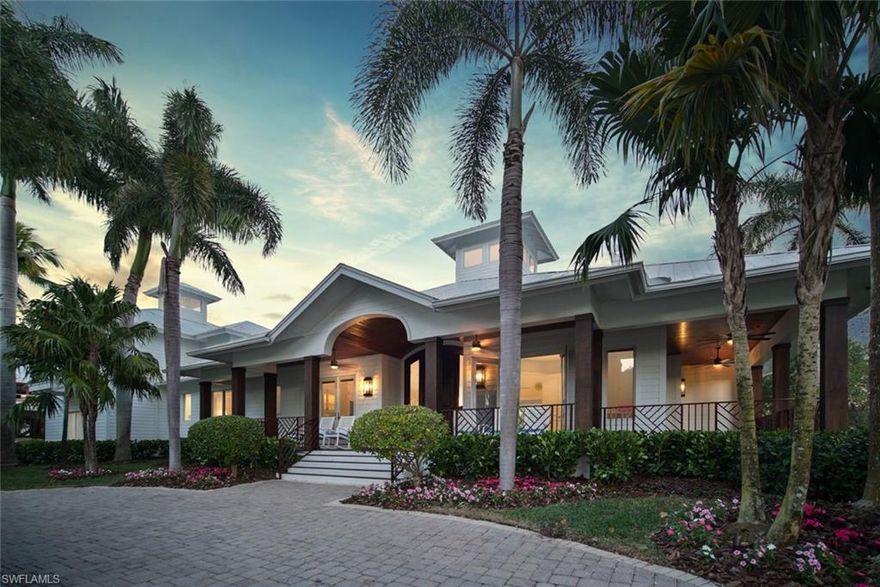 The perfect location in Old Naples! Across from the beach and central to both 5th Avenue South and 3rd Street South shopping and dining. An expansive lot size measuring 133 x 150 with a freshly designed landscape. A Stofft Cooney designed renovation in 2014 brought a new and luxurious interior with coastal modern finishes. Andersen impact windows and doors, custom cabinetry and built ins, A/V, Sonos surround sound, and video security are a few of the features. The Wolf/Subzero appliances, wine storage, ice maker, and Wolf grill and pool bar accent this beautifully integrated indoor-outdoor living space totaling almost 9,500 sq ft. Many exterior upgrades like the wrap around front trex deck, and 45 foot custom pool and spa with marble decking offer optimum outdoor spaces. Guest quarters above the three car garage with full kitchen and laundry offer one of the nicest guest studios in Old Naples.