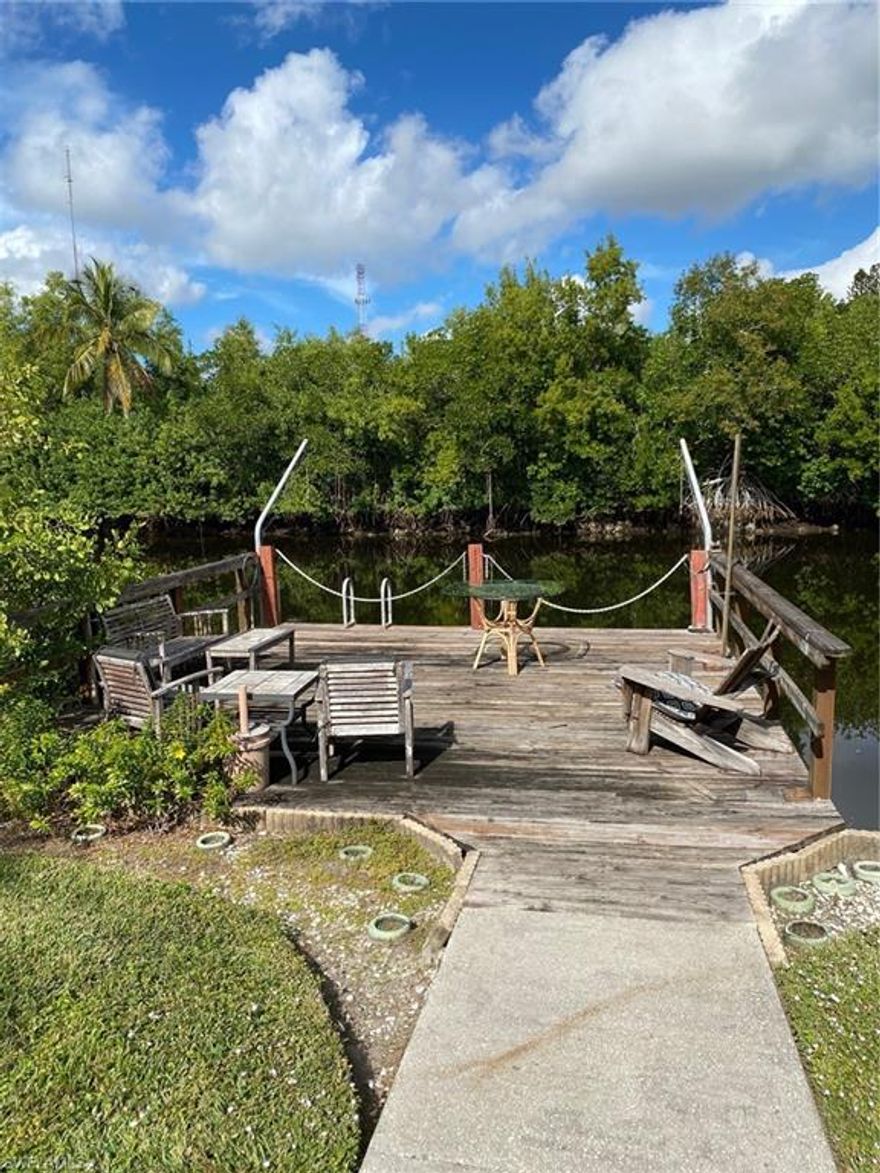 HIDDEN GEM LOCATED BETWEEN NAPLES AND MARCO ISLAND.RIVERWOOD ESTATES 55+ BOATING COMMUNITY. HOA $190. ANNUALLY. YOU OWN YOUR LAND. Community boat ramp and dock. 20 minutes to the Gulf of Mexico or lunch by boat in Naples or Marco Island. This home is on the water with gulf access.