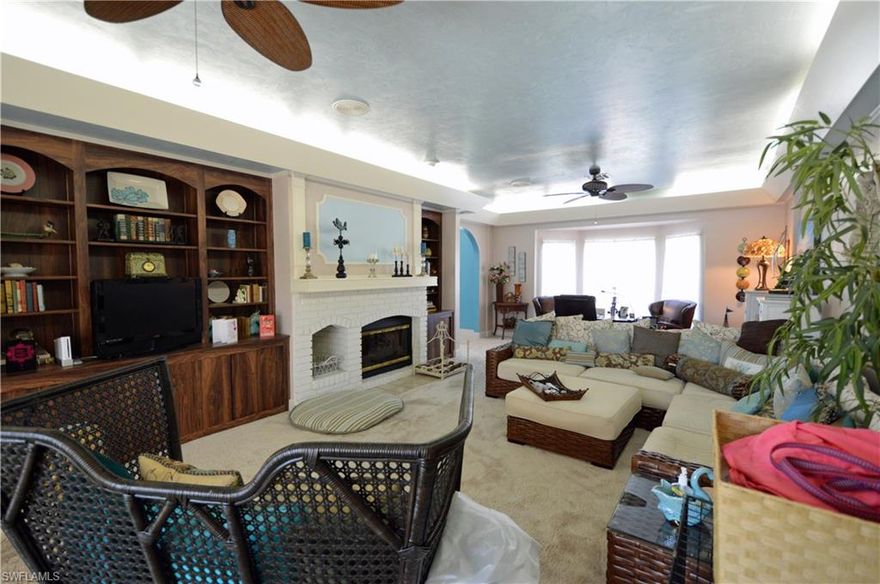 SPECTACULAR VIEW OF WATER AND GOLF COURSE OFFERED AT A BARGAIN PRICE. The home boasts a large master suite on the main level and two bedrooms, bath and loft on the upper level.  Each bedroom has a patio and view of water and the golf course.  The loft is perfect for a guest living area, den or office.  There is a grand staircase leading from the foyer to the upper level.  This is a home which requires a visit to appreciate the size of the home and the spectacular view.  It priced to sell with 4116 square feet under air and 6856 total square feet.  This home is located in The Forest Country Club.  The Forest is a gated golf course community which offers golf, tennis, bocce ball, and social activities.  Membership to the club is not required to live in the community.