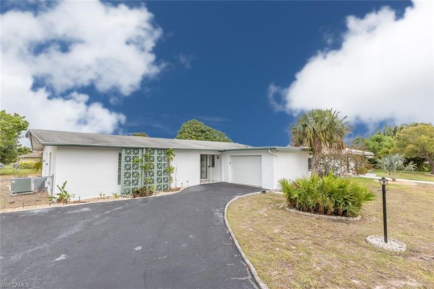 Lowest priced 3/2 single family home in 33904 - Entering through the front door, it's evident that this home has been well cared for by its owners. You are greeted by the main living space and dining area off the kitchen with a wide view of the over-sized fenced-in yard. Terrazzo flooring throughout the home. The kitchen is light and bright with ceramic tile counters and bead board accent walls. The kitchen features all white cabinets, appliances and a separate eating area. The 1-1/2 car garage is located just off the kitchen for easy access to the washer and dryer area. The master bedroom is large with an en suite bathroom, pedestal sink and shower. The other two bedrooms are spacious and would make a great guest room and office space. Guest bath. Yard is large enough for pool and decking.  Walking distance to Cape Elementary - A GREAT STARTER HOME!!  New A/C system, May 2017.