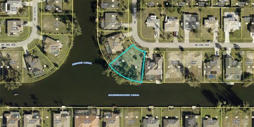 WOW!  WHAT A VIEW!!  Located in the growing community of Cape Coral, this waterfront residential building lot has spectacular view of intersecting waterways with 146 feet of water frontage on over a third of an acre.  You will spend many hours enjoying the Florida wildlife, fish, and waterfowl that abound in this area.  Purchase the home adjacent to this property, and you will have 2 thirds of an acre of prime water frontage with room to expand your residence.  Proximity to local beaches, dining, shopping, and golf courses makes this property ideal for the Florida lifestyle. Also, easy access to public parks with bike and walking trails and picnic areas, and boat ramps providing access to many waterways, beautiful Charlotte Harbor, the Peace and Myakka Rivers, the Caloosahatchee River, and the Gulf of Mexico. Quiet community, yet all conveniences and amenities nearby. Great waterfront location in a great neighborhood.
