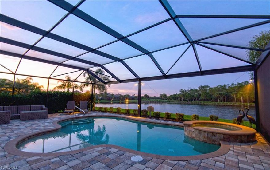 Relax on the oversize lanai enjoying your morning coffee at sunrise with long lake and golf course views.  Enjoy private dusk and sunset picture frame views over the lake and golf course as you cookout with family and friends.  Wind down after a day of golf, tennis, fishing, or boating in the heated pool or spa with complete privacy on the widest area of the oversized pie shaped lot.  Partake of all of the magnificent amenities in the Quarry offers including membership golf, private beach on the 500 acre lake, boat docks, tennis, pickleball, bocce ball, attended workout center, lap pool, resort pool and more.  Enjoy the well appointed dining facilities at the Beach Club.  The Bellingwood floor plan features a full three bedroom layout which has been nicely upgraded throughout. Come and go as you please with the comfort of full shutter protection on all doors and windows including a storm curtain on the covered porch.  Come and view all that this exceptional vacation home and resort lifestyle can offer !