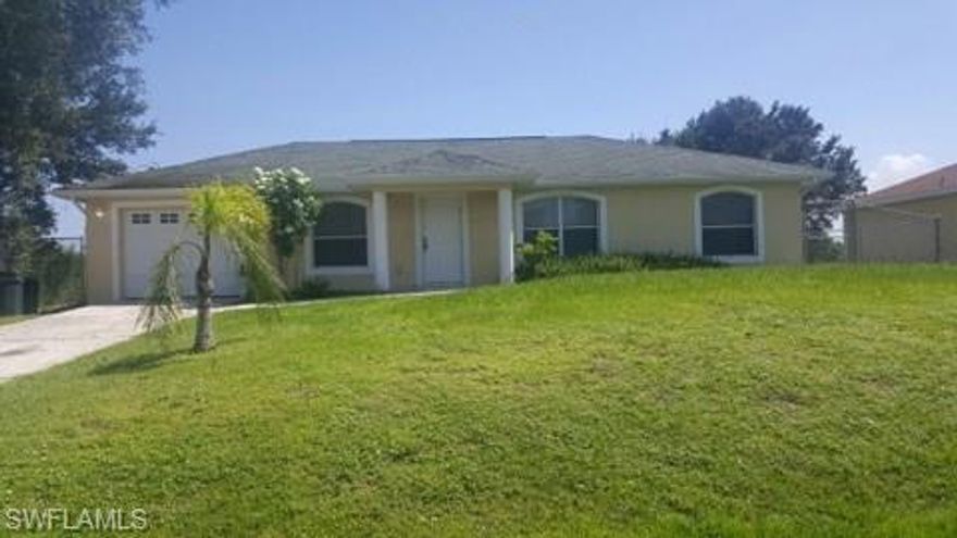 3 bedroom 2 bath 1 car garage with tile floors.  Located in popular SW Lehigh with an easy commute to SR 82 and I-75.  Call for your private showing today.  New water equipment and newer a/c unit that has been caged.  Dead end road.