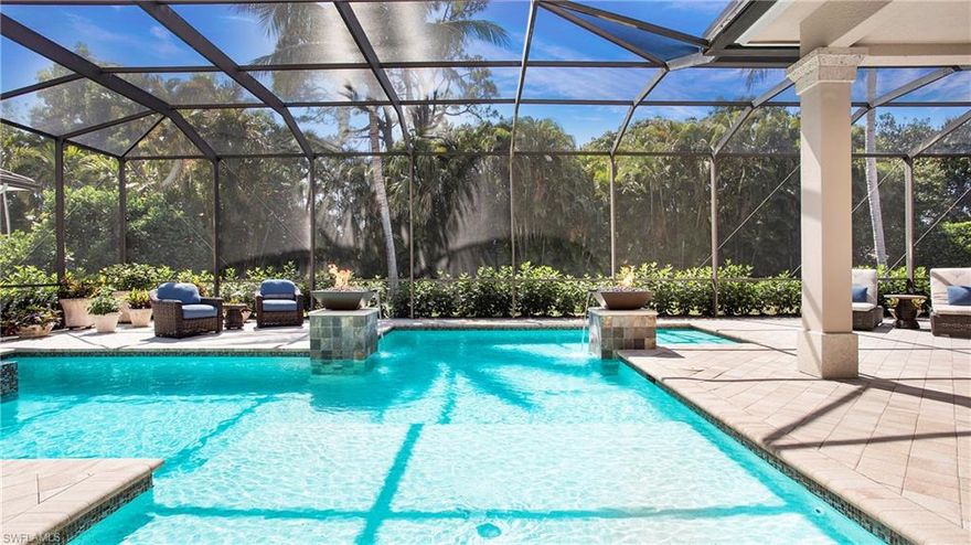 Located in the highly coveted Moorings neighborhood of Naples. Step inside this custom-built residence through the mahogany front doors, and you'll immediately appreciate the craftsmanship and architectural details that sets this property apart. This spacious residence, 4122 square feet, boasts 4 bedrooms plus den, along with 4.5 elegantly appointed bathrooms. The chef's kitchen is equipped with top-of-the-line cabinetry, wine cooler, Wolf & Sub Zero appliances. The expansive lanai invites year-round enjoyment with a spectacular pool and spa, accented with dramatic fire and water features, summer kitchen, gas fireplace and Cypress wood ceiling. Set on a private oversized lot, this coastal retreat is mere minutes from the Gulf, offering exclusive private beach membership to Moorings residents. Embrace a lifestyle of elegance and exclusivity at 645 Rudder Road tailored for those who appreciate the finer things in life.