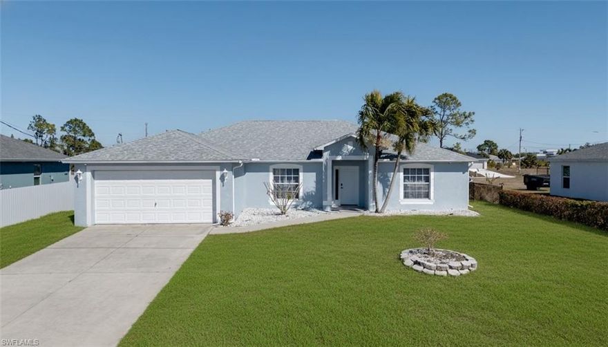 Welcome home to this spacious and beautifully updated property located in the highly desirable Northeast Cape Coral area! This home is being completely refreshed with brand new luxury vinyl plank flooring, fresh interior paint, new ceiling fans, and stylish updated door hardware throughout, giving it a clean, modern feel that today’s buyers will love. Enjoy peace of mind with a newer roof installed in 2023, along with a thoughtfully designed layout featuring a large primary suite complete with a walk-in closet and a relaxing soaker tub—perfect for unwinding after a long day. Step outside to your backyard oasis where you’ll find two mature mango trees, offering shade, beauty, and delicious seasonal fruit right at home. Located in a quiet and established NE Cape Coral neighborhood, this home is still just minutes from shopping, dining, and everyday conveniences, making it the perfect blend of tranquility and accessibility. Whether you’re a first-time homebuyer looking for the perfect place to start your next chapter, or an investor searching for a solid opportunity, this property checks all the boxes. Schedule your private showing today—this one won’t last!