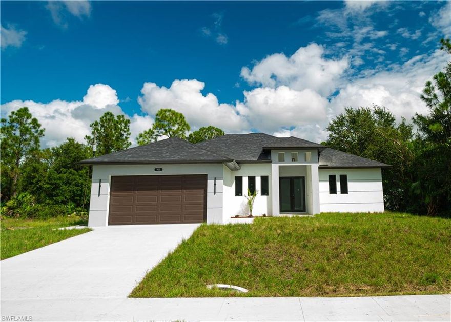 Experience modern living in this elegant 3-bedroom + Den, 2- bath home in Lehigh Acres. Featuring gold fixtures, beautiful floor tiles, and high-end finishes throughout. Enjoy the outdoor kitchen and open layout - perfect for entertaining and family gatherings.