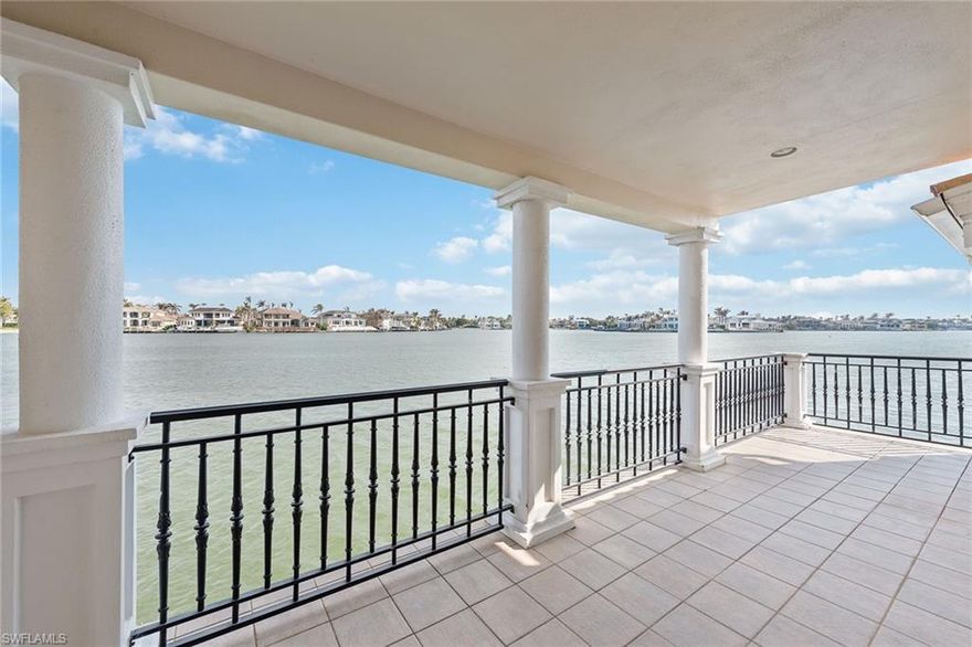Located in Park Shore and one of only 32 unique units, this beautifully crafted community sits directly on Venetian Bay with gorgeous panoramic views of the water and dolphins. Boasting high ceilings, wood floors, 3 stories with a private elevator, and covered balconies hovering over the Bay, this property truly is Naples. As a corner unit, it allows for long Bay views to the east, south and west, so you’ll have spectacular sights from every room. The ground floor features 2 en-suite bedrooms, family room, sunroom and 2 balconies. A grand staircase leads to the 2nd floor perfect for entertaining, with a huge living room, and an eat-in kitchen and formal dining room with walls of glass to maximize the glistening views. The 3rd floor master suite encompasses a private balcony, study, wet bar, and grand changing room with expansive built-in cabinetry. If you love the water, you will love this home! It is a boater’s delight with on-site boat slips available for lease, and just across the street is deeded beach access. When you add in the bay side pool, gated entrance, private garages and onsite manager, you’ll see why these homes rarely go up for sale. After a day on the water, Venetian Village’s renowned dining and shopping is just a short walk away.