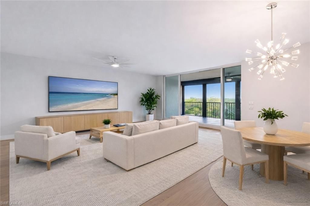 Photo of 425 Cove Tower DR #403, NAPLES, FL 34110 (MLS # 226014924)