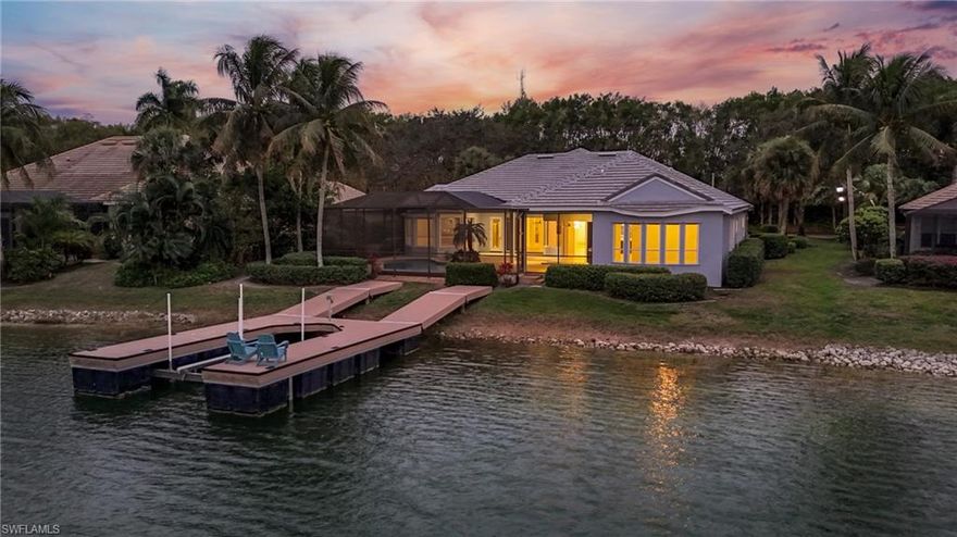 Miromar Lakes is unlike anywhere else in Southwest Florida, and 18361 Verona Lago Dr is where that lifestyle reaches its peak. Positioned on one of the community's most breathtaking long water views, this home gives you a front-row seat to everything that makes this place so special. The lake is not a backdrop here. It is the heartbeat of the daily rhythm, visible from the living spaces, the lanai, and the primary suite, and accessible from your own private dock and 7,000 lb boat lift just steps from the back door. The home has been thoughtfully updated where it counts. The primary suite bath was beautifully remodeled in 2025. Porcelain tile flooring runs throughout the home and front porch. Lighting has been updated throughout. A brand new roof was installed in January 2025 and exterior painting was recently completed. The whole-home Sonos sound system and reverse osmosis water system are dialed in and ready to go. The big ticket items have been handled so you can step into the good life from day one. The indoor-outdoor flow here is the real story. Zero corner door sliders open the main living area to the lanai, where a pool, spa, outdoor kitchen, and built-in grill set the stage for effortless entertaining with a water view as your backdrop. Whether you are hosting a sunset dinner or simply unwinding after a day on the lake, this is the space that makes it all possible. The three-car garage rounds out the practical side of luxury living, with an electric car charger, updated lighting, and custom cabinetry storage that is as polished as everything else. The floor plan lives generously with 4 spacious bedrooms, an executive office, a flexible bonus room, and 4 full baths across a single-story ranch layout designed for both everyday comfort and elevated entertaining. Soaring volume ceilings, zero corner sliders, and a gas kitchen add to the experience throughout. And then there is Miromar Lakes itself. A resort-style community where the beach club, dining, wellness, marina, fitness, pickleball, tennis, and a vibrant social calendar give you that exclusive membership feel without mandatory golf. Gated, polished, and perfectly positioned near the airport, shopping, and all the Naples, Bonita, Estero corridor has to offer. This is a rare front-row seat in one of Southwest Florida's most coveted communities, with the lot, the lifestyle, and the boating access to match. Come see it in person. Once you see this view, you will understand why people never want to leave.