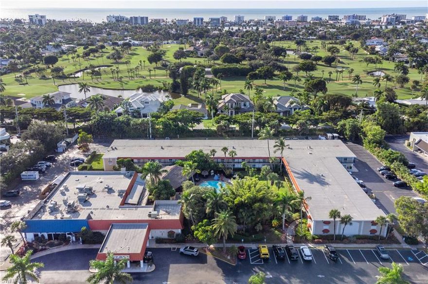 Where Tropical Paradise meets Savvy Investment!! Here at the GulfCoast Inn, not only is the location going to knock your socks off -- the ease of renting will have you saying Cha-Ching! Near World-Class Beaches, shopping, dining, beautiful scenery and perfectly manicured everything, the central location allows for the Perfect Florida Lifestyle options. Upon entering the well-kept main office, you will find the front desk and breakfast area for guests/owners. 3 restaurants ON SITE for super easy living. The renowned "Harold's Place" is your poolside destination for a delicious burger and a stiff drink. If you are feeling like something just a few steps away, you have Fujiyama and Vesuvio's Pizza right there as well. The resort style pool has tiki tables to fit the whole vibe, plenty of loungers and umbrellas for shade. There are only two floors, and this condo is on the 2nd floor so NO flooding up there! Just the right sized studio, complete with kitchenette and bathroom. Gorgeous wood cabinetry, tile floors and recent updates inside. SUPER CLEAN!! There are multiple vending machines and ice machines around the property. Free Laundry room for owners and storage area for bikes, goodies, etc. Coin-Op laundry for tenants. Tons of Parking!! This place is RIDICULOUSLY AFFORDABLE considering the average home price in the neighborhood. You are nestled in one of the most expensive zip codes in the country - yet spending less than 140K! Don't walk, RUN over and take a peek at this Fantastic deal! Perfect for ANYONE ~ from snowbirds to college students and everyone in between! One-stop-shop with management on-site. You can book this long term or as short as nightly. Such flexibility with this property. It is great to add to your real estate portfolio - or to make this your little Florida-getaway. WELCOME TO PARADISE!