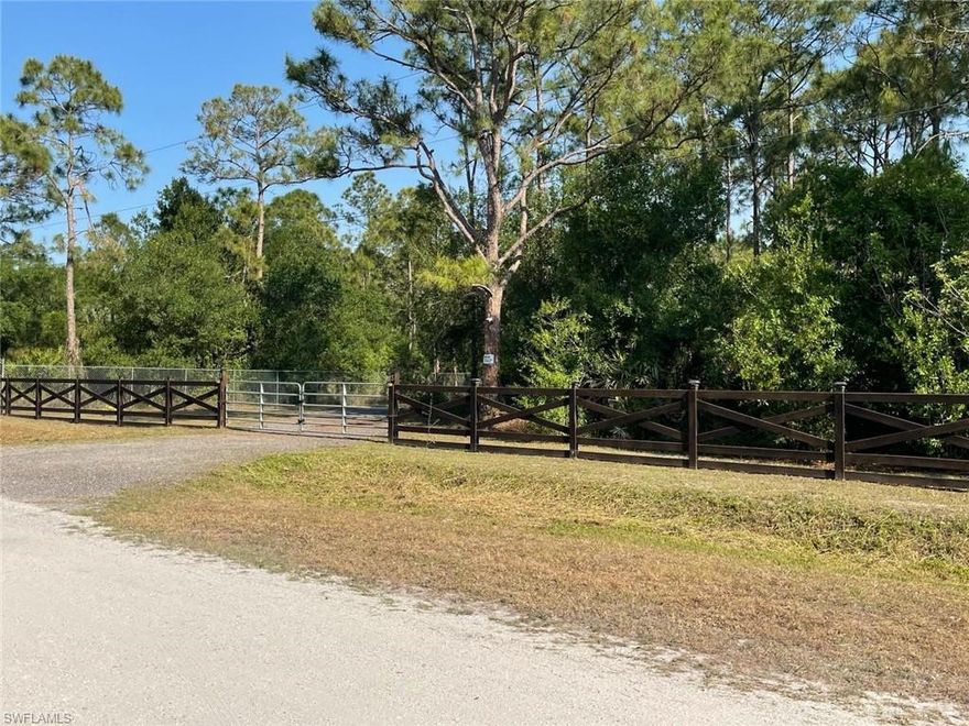 1.02 acre corner lot. Parcel fronts Pine Cone Avenue. Gravel driveway present on the lot. Wood fencing present at the front of the parcel. Metal fencing present along the sides of the parcel. Metal fencing present at the rear of the parcel. Natural hedge present along one side of the lot.

The parcel contains open land areas. Vegetation is present on portions of the lot. Existing fencing outlines portions of the property. Driveway access is visible from the road. Corner location provides frontage on more than one side. Property boundaries are partially defined by fencing and natural growth.

All structures and features referenced are present as observed.