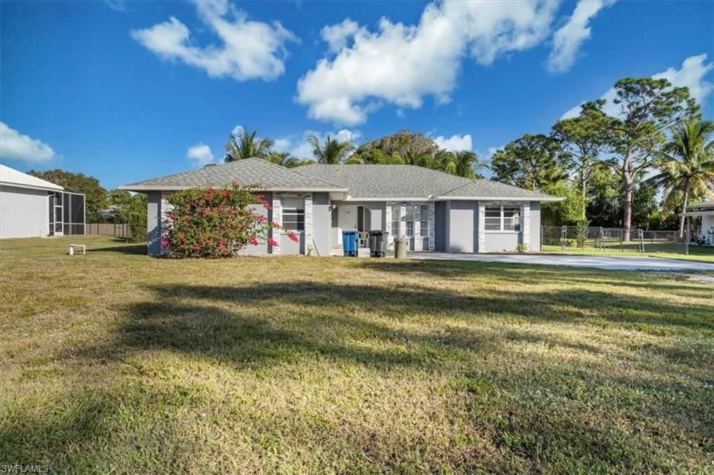 Photo of 28405 Mango DR, BONITA SPRINGS, FL 34134 (MLS # 225083521)