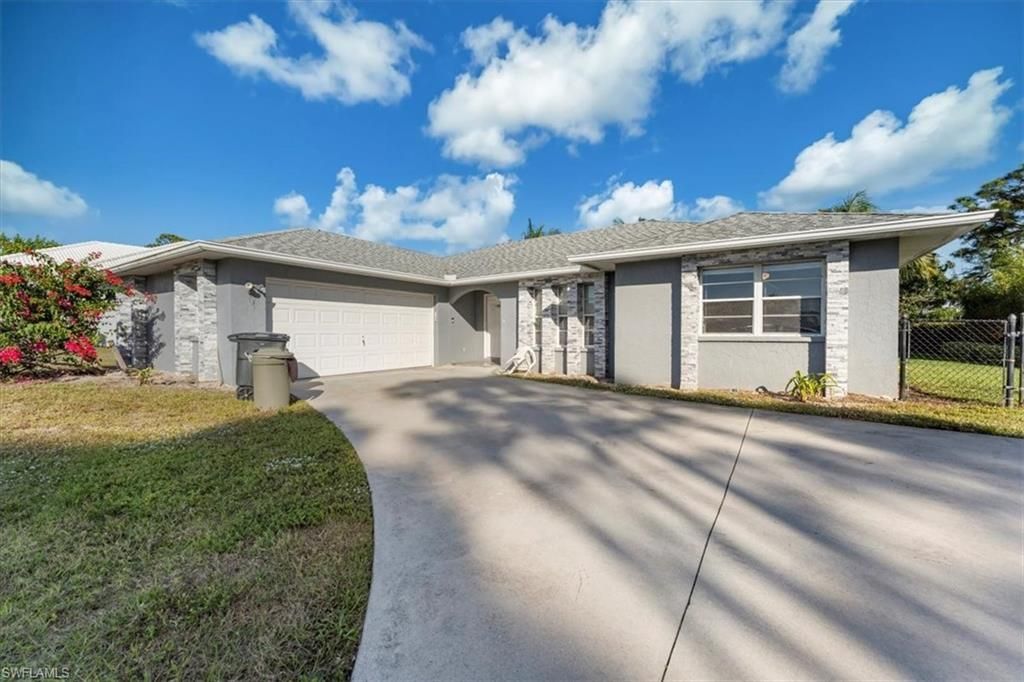 Photo of 28405 Mango DR, BONITA SPRINGS, FL 34134 (MLS # 225083521)