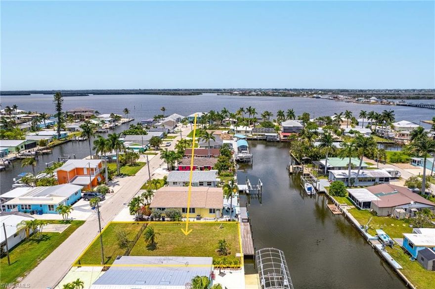 SELLER FINANCING AVAILABLE ASK YOUR AGENT FOR DETAILS!!! Welcome to the cutest, artsiest, colorful town of Matlacha!! This unique little slice of paradise lies between the west coastline of Cape Coral and the east coastline of Pine Island. Matlacha houses the "Most fished bridge in the country" where you'll find numerous people fishing all year round for their prize catches of Snook, Redfish, Drum, Snapper and the infamous Catfish. If your looking to live the island life...you'll want to throw your anchor here and start building your home by the sea! This lot is located off Island Ave. in the center of this small town and within walking distance to the Famous Blue Dog Restaurant, Yucatan Bar and Grill, The Perfect Cup (for the best breakfast)and numerous shops, bait stores and such. Matlacha is still healing from Hurricane Ian, but, coming back stronger than ever. If you love small town charm, a community that works together for one another, and has a colorful vibe like no other, look no further than right here. This lot is ready for your building plans, has great deep water direct Gulf Access, dock in place and waiting for you! Come and take a look, you won't be disappointed, there is fantastic rental potential here or just sit back, throw a line and enjoy yourself!