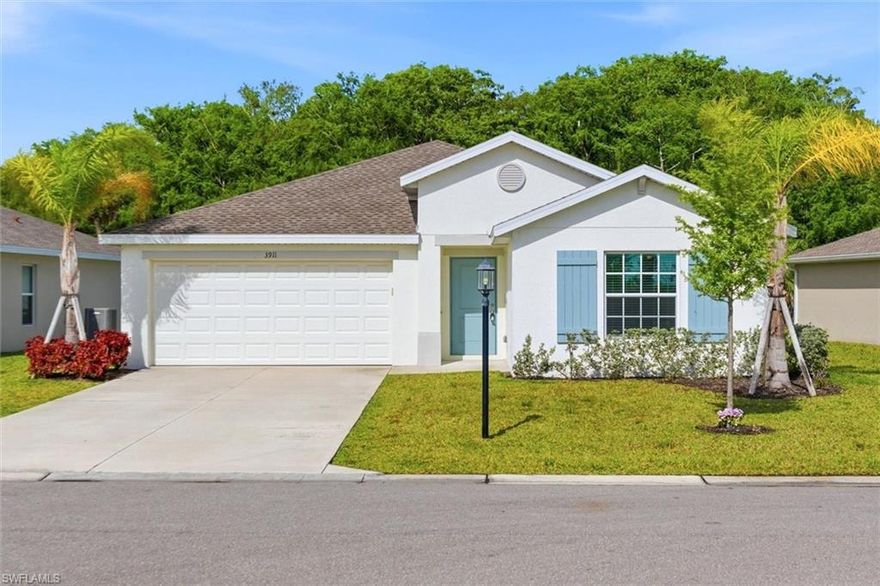 HARTFORD FLOOR PLAN!!!  This 4 Bedroom 2 Bath Home features ALL TILE FLOORS + HURRICANE IMPACT GLASS WINDOWS-DOORS.  Located on an oversized home site with WOODED Views!!! Home features wood cabinets, Quartz Counters, Stainless Steel Appliances, Washer, Dryer, and a 2 car garage.  Oakview is an non-gated community right off Buckingham Road.  HOA includes lawn mowing, irrigation maintenance, and Hi-Speed Fiber Optic internet.  This home is located in the cul-de-sac area near the end of the community.  Home is ready for its new Owner!!!