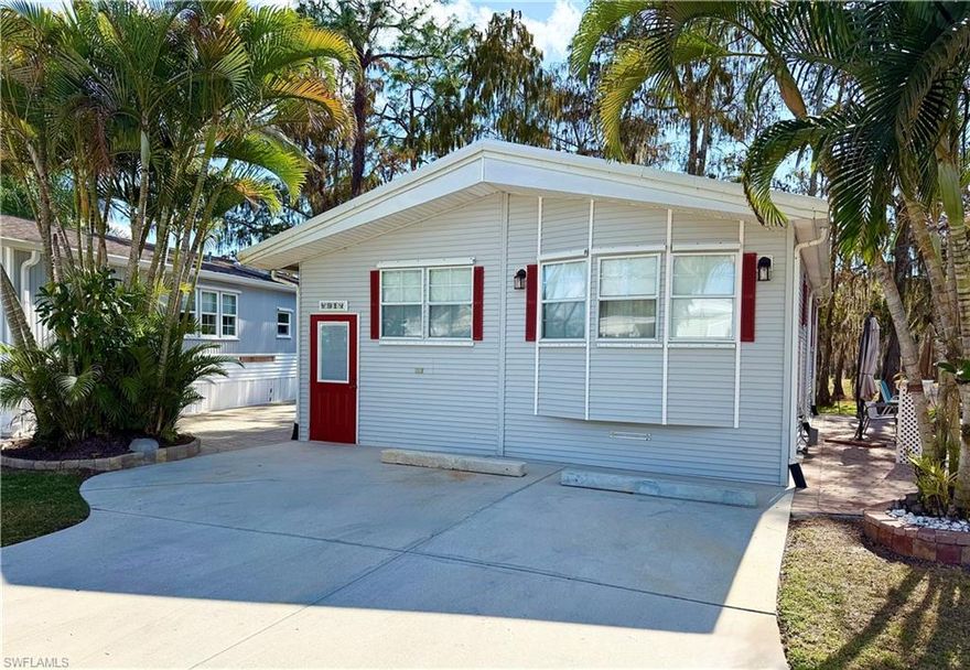 Welcome to resort-style living at an affordable price— Thank you for viewing 91 Vanda Sanctuary in the Imperial Wilderness Condominium Association of Naples, FL. This particular community was never flooded or adversely affected by any recent hurricanes. Plus, it is well-known for its outstanding maintenance, friendly residents, and strong sense of community. This very clean and well maintained 2Br/1.5Ba home, situated on LAND that YOU OWN, is being sold furnished. It features a wonderfully relaxing rear grassy view from the windows and screened lanai. This home offers new flooring in the living room, first bedroom, and hallway. This bedroom contains new furniture. This is truly a home in which you can move right in and begin to enjoy the tropical delight that is Naples, Florida! Stop suffering in the cold; experience Florida Life! IWCA is brilliantly located. It is approximately 3 miles to shopping and restaurants, 11 miles to the Naples beaches, and 8 miles to the Marco Island beaches. Airport access is also easily attainable— a 45-minute drive (RSW). Maximizing the opportunity to affordably own property in Naples, FL, the HOA fee of $898. per quarter is exceptionally reasonable. That fee covers many of your needs: the safety of a gated community, water, sewer, lawn care, basic cable, trash, recycling, and community amenities. Community amenities include 2 pools with spas, bocce, pickleball, pétanque, tennis, shuffleboard, billiards, ping pong, a library, clubhouse, 2 dog parks (1 pet, 40lb. max.), nature trail, an extremely active events calendar, and an overall positive vibe!
