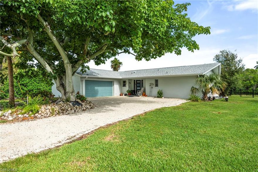 Waterfront Paradise Just Minutes from 5th Ave! Discover your slice of Naples paradise in this beautifully remodeled Gulf access pool home, ideally located just 5 minutes from world-famous 5th Avenue and Naples’ white-sand beaches. Freshly updated in 2024, this home shines with modern coastal style — featuring Quartz countertops, stainless steel appliances, and elegant tile flooring throughout. Both bathrooms have been upgraded with high-end finishes, creating a fresh, move-in-ready feel. Major improvements include a new roof and A/C (2020) for peace of mind. Step outside to your private backyard oasis — complete with a sparkling pool, dock and quick 15-minute boat access to the Gulf of Mexico via Rock Creek and Naples Bay. Whether you’re entertaining friends, fishing off your dock, or cruising to the Gulf at sunset, this home makes every day feel like vacation. Enjoy the quiet park-like green space across the street, and the freedom of no HOA or deed restrictions. Bring your boat, your golf cart, and your love for the waterfront Florida lifestyle — this Naples gem is ready for you to move right in!