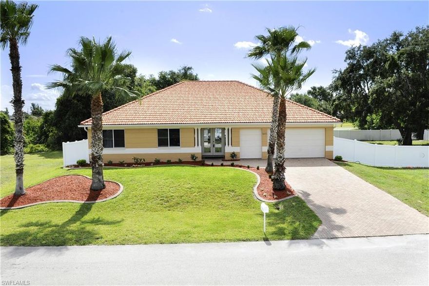 You will LOVE this custom built 4 bedroom, 3 full bathrooms POOL home with 2.5 car garage and a tile roof. As you pull into the pavered driveway you will notice the beautiful brand new landscaping while approaching the glass french front doors! This property incorporates a 4 LOT SITE, just under a 1/2 acre & has a white vinyl privacy fence all the way around!  This home features high tray ceilings with lighting, plant shelves, rounded edge walls & the back of the house is lined with tall pocket sliders that lead to the pavered pool deck area.  You will enjoy generous living space and stylish finishes including granite counter-tops, travertine tile at the kitchen bar & more! This house is a perfect setting for relaxing and entertaining. Incredible master bedroom which includes 2 closets & an extra walk in closet with a full length mirror & sliders out to the pool! (1 of 2 rooms in the house that have sliders out to the pool) Inside laundry room with plenty of storage & more. Schedule your showing today- 
NEW- Exterior/Interior Paint (2016) hot water heater(2017) pool pump (2018) bathroom faucets/hardware (2018) Septic was last pumped (Dec 2017)
