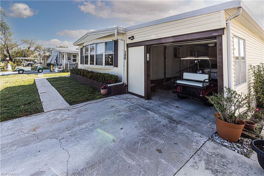 West Wind Estates is a friendly 55 plus community located just a few short miles from Marco Island. This home is good sized and has 2 bedrooms with ensuites. Some of the features include a large front lawn, a garage large enough to park your car and your golf cart, and a large workshop.  You can see the love that has been put into this home over the years with additions added over time.  You can enjoy watching your grandchildren play in the yard from your finished porch area.  Close to Walmart, Publix, Walgreens, and CVS.