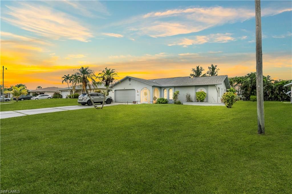 Photo of 4424 SW 13th AVE, CAPE CORAL, FL 33914 (MLS # 226014534)