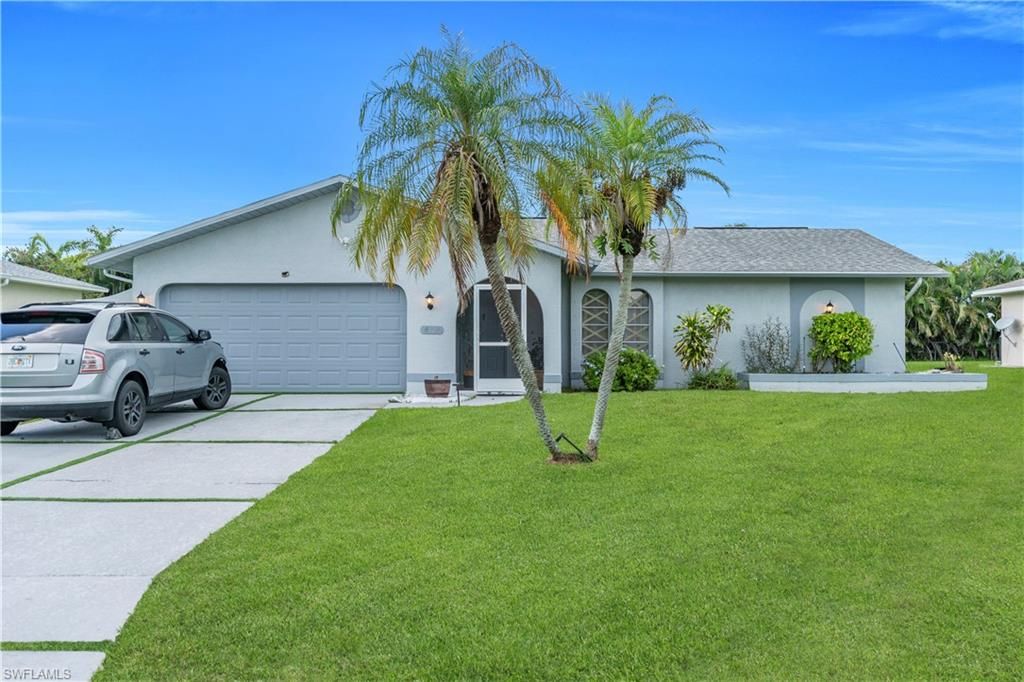 Photo of 4424 SW 13th AVE, CAPE CORAL, FL 33914 (MLS # 226014534)