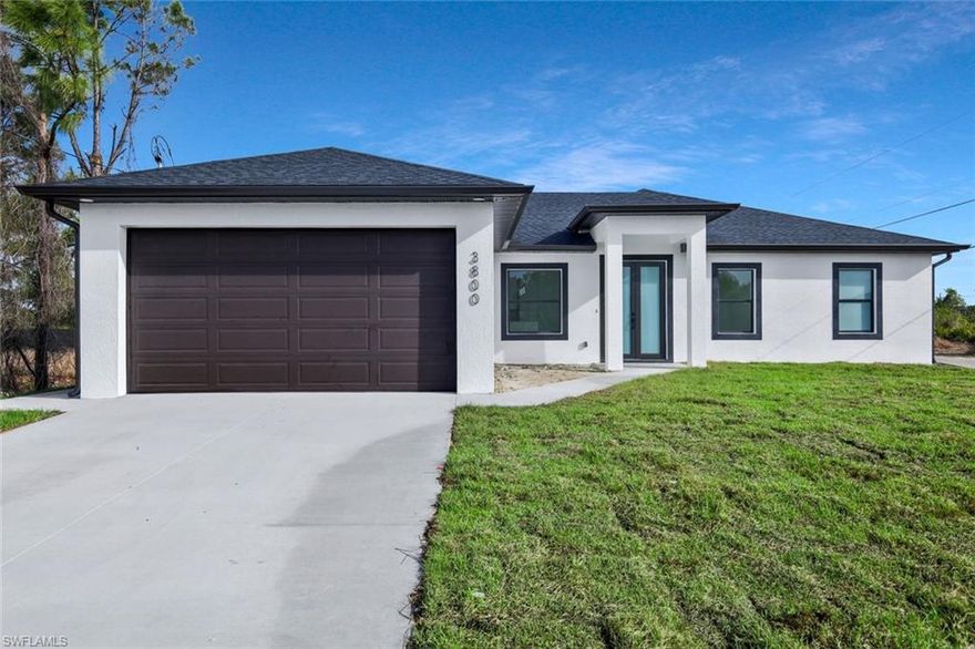 Beautiful modern new construction, close to Gunnery Road and Route 82, with convenient access to Fort Myers and I-75. This residence perfectly blends comfort, style, and convenience. Offering three spacious bedrooms plus a versatile den, the home also features an expansive patio with outdoor kitchen, ideal for entertaining family and friends. Situated on an oversized corner lot at the end of a quiet cul-de-sac, the property provides enhanced privacy and generous outdoor space. Elegant tile flooring flows seamlessly throughout the home, complemented by impact-resistant windows and doors for added security and peace of mind. The kitchen is a true showpiece, highlighted by soft-close cabinetry, abundant storage, and a striking waterfall island wrapped in sparkling white quartz. Sleek stainless steel appliances complete the contemporary design, creating a space that is as functional as it is beautiful. CO expected this month, appliances will be delivered, soon.