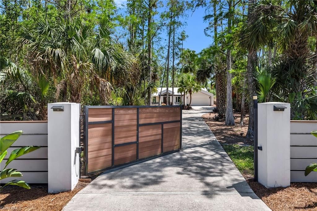 Photo of 5330 Cherry Wood DR, NAPLES, FL 34119 (MLS # 226017774)
