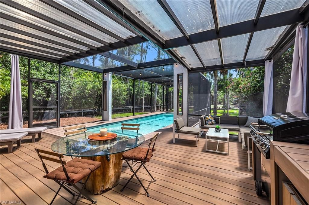Photo of 5330 Cherry Wood DR, NAPLES, FL 34119 (MLS # 226017774)