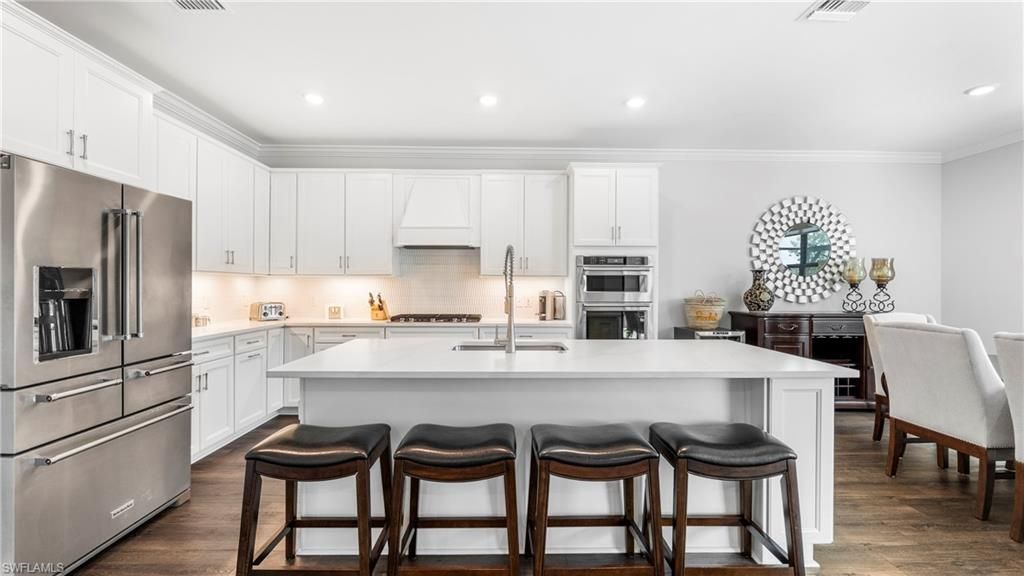 Photo of 10428 Ventana LN, NAPLES, FL 34120 (MLS # 226012204)