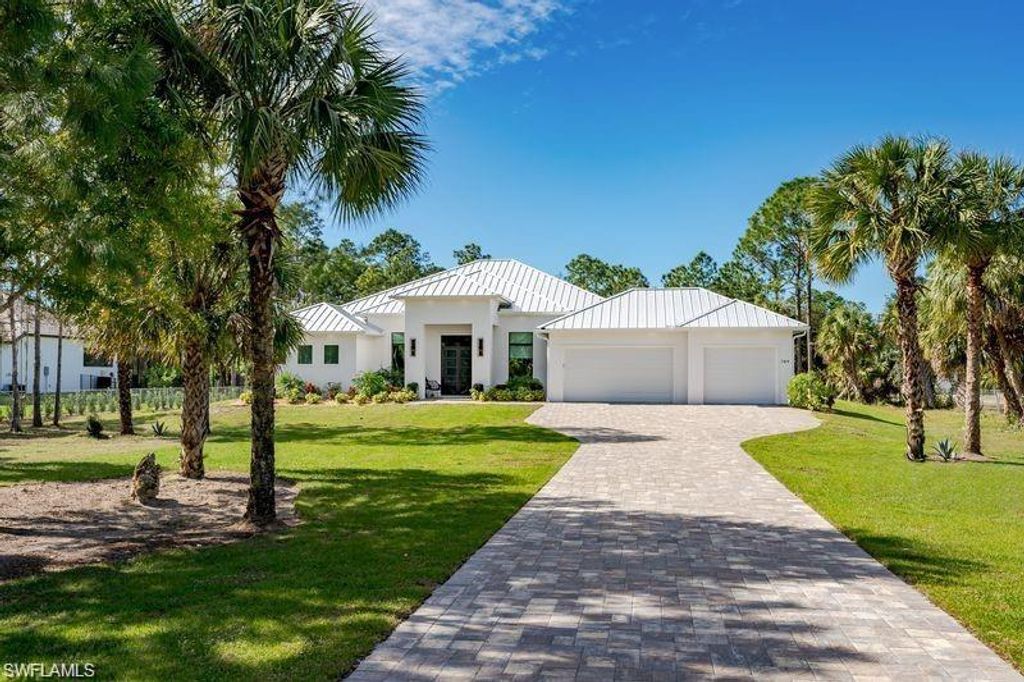 Photo of 709 15th ST SW, NAPLES, FL 34117 (MLS # 226015988)