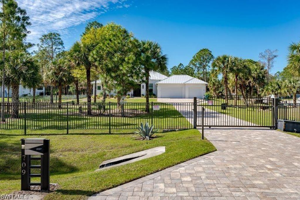 Photo of 709 15th ST SW, NAPLES, FL 34117 (MLS # 226015988)