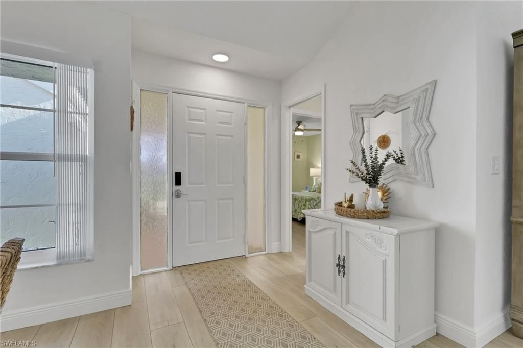 Photo of 805 Reef Point CIR, NAPLES, FL 34108 (MLS # 226004590)