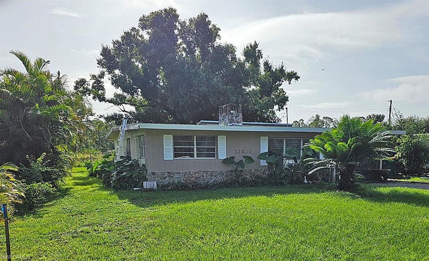 This adorable Tropical Gulf Acres property is looking for a new owner!!!  Home is conveniently located off US 41, close to I75 and downtown Punta Gorda.  You'll enjoy the serenity of a quiet neighorhood while still being clsoe to local amenities.  New roof last year, Some new paint and lots of other new items.  Bathrooms and kitchen remodeled.  This is a must see at this price.