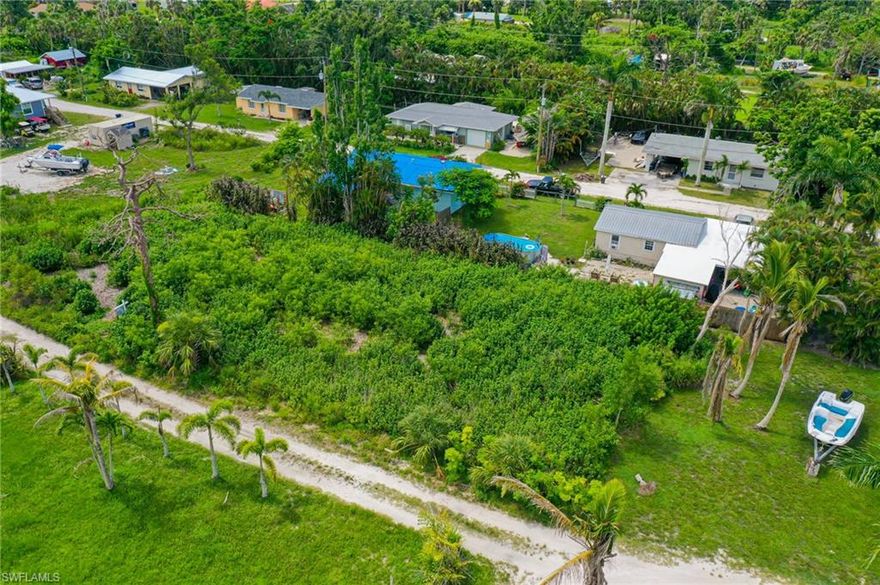 Experience the ability to Build a one of a kind dream home on this oversized Double lot. Build it big or small and have lots of land to spare. You can add your very own garden. This private area on Pine Island allows you to enjoy serenity and peace. Owners cleared the heavy trees and it should not take much to clear again. Bokeelia is a beautiful place to call home. Close to Marinas. Don’t miss out on this one. Ask about the sellers home that is located across the road that is also listed for sale.
Last 4 pictures are when Sellers cleared the land so that you can see the potential.