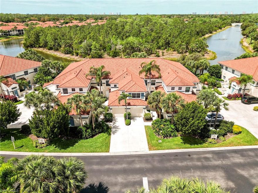 More than REMODELED, this Grand Home III carriage home offers a totally RE-DESIGNED KITCHEN featuring  OPEN FLOOR PLAN and generous 16 ft ISLAND filled with storage space. 42" White SHAKER CABINETS WITH LIGHTED GLASS UPPER CABINETRY, PULL -OUT DRAWERS AND QUARTZITE COUNTERTOPS COMPLETE THE LOOK- STUNNING BUTLER'S PANTRY IN BLUE PORCELAIN offers even more Storage and Functionality. SPACIOUS MASTER BEDROOM IS OVER 200 SQ FT OFFERS SITTING ROOM AND SLIDING DOOR TO LANAI. 
GORGEOUS MASTER BATH With 10 FEET OF QUARTZITE COUNTERTOPS OFFERS DOUBLE VANITIES AND STUNNING MARBLE MOSAIC BACKSPLASH. 
Over 10'4'' CEILINGS ADD TO THE SPACIOUS FEEL THROUGHOUT. Bedroom #3 which is 16 x 15 is designed to be a Studio/Leisure Room/Guest Suite and adds to the LIVABILITY of this well-designed Carriage Home. 
Garage floor is painted with Epoxy finish. Just a few steps directly across the street is one of the 5 pools conveniently located in Lighthouse Bay.  
If you don't have months and months to make remodeling decisions and months and months to get the work done satisfactorily- the work is already done and ready for you to enjoy!!!