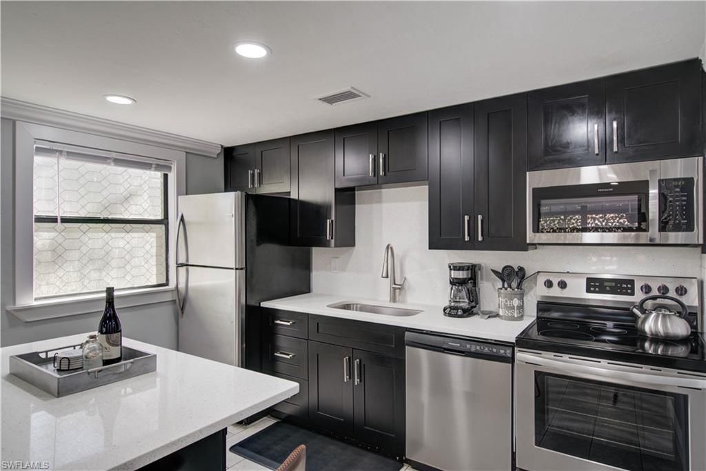 Photo of 5322 Treetops DR #I, NAPLES, FL 34113 (MLS # 226010696)