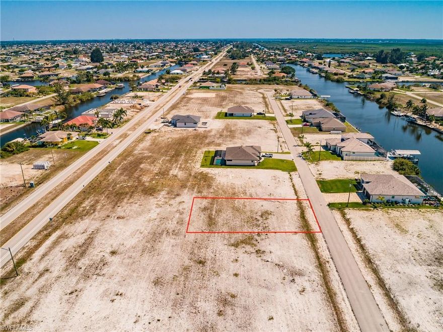 This great lot is in the fast growing NW Cape Coral area. The lot is just east of the Salida Canal and a little further east of the Spreader gulf access canal. A two story home could have a beautiful view of the Salida Canal! This lot is just south of Burnt Store Marina and a quick drive to I-75 and 41. Build your new home in this highly desireable area!