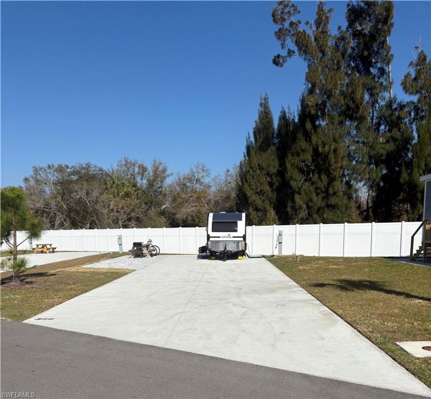 Welcome to Lot 356 at Palm Breeze RV Resort in Punta Gorda, Florida. This desirable perimeter RV lot offers a rare combination of privacy, location, and finished outdoor space. Backing up to a privacy fence, the rear of the property provides a quiet and secluded setting with no rear neighbors, creating a peaceful retreat while still being close to everything the resort has to offer.

Ideally positioned near the clubhouse and resort amenities, this lot offers convenient access to the pool, fitness center, pickleball courts, and social gathering spaces. It is also located near the bath facilities, providing added practicality for owners and guests. Directly across the street from the lake, the lot enjoys an open, airy feel and pleasant water views without the premium price of direct lakefront ownership.

A paved patio sets this lot apart from others, creating an inviting outdoor living space ready for relaxing or entertaining. There is ample room to further customize with a tiki hut, outdoor kitchen, expanded seating area, upgraded landscaping, or additional pavers to suit your personal vision.

Whether you are seeking a seasonal retreat, a winter residence, or an investment opportunity in one of Southwest Florida’s newest luxury RV communities, Lot 356 offers privacy, convenience, and strong overall positioning within the resort.