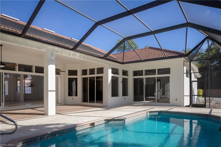 Best deal in Devonwood Estates! A rare multi-generational estate featuring a fully private guest wing, dual kitchens, four-car garage, and heated resort-style pool—enhanced with fresh interior and exterior paint, brand-new carpet in all bedrooms, newly finished garage floors, a fully fenced expansive yard, and coveted southern exposure.
Designed for flexibility and privacy, this exceptional residence offers 3 bedrooms plus a den/office and 3.5 baths with two distinct living environments. The private guest or mother-in-law suite includes its own entrance, separate living room, full contemporary kitchen, bedroom and bath, and a private screened lanai with direct access to the pool—ideal for extended family, guests, or a live-in arrangement.
The main home features a spacious great room, formal dining area, large eat-in kitchen with rich wood cabinetry, and a versatile den or home office. Polished tile flooring, volume ceilings, and abundant natural light enhance the home’s timeless appeal, while new bedroom carpeting delivers a truly move-in-ready feel. An oversized laundry room with extensive cabinetry adds everyday convenience.
Outdoor living is a highlight, with a large screened lanai, heated oversized pool, and a fully fenced yard offering expansive lawn areas, an outdoor fire pit, and a private putting green—perfect for entertaining, recreation, or quiet evenings at home. Mature landscaping provides excellent privacy throughout the property.
A paver driveway leads to the impressive side-entry four-car garage with newly finished floors, completing this thoughtfully updated estate.
Located within the coveted, highly desirable gated Estate Home Community of DEVONWOOD ESTATES, residents enjoy tennis and basketball courts, gated boat and trailer storage, and close proximity to Southwest Florida International Airport, Coconut Point Shopping Mall, and the attractions of Bonita Springs, with Sanibel, Captiva, and Bonita Beach just a short drive away.