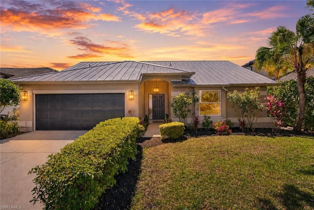 Photo of 10987 Fieldfair DR, NAPLES, FL 34119 (MLS # 226019790)