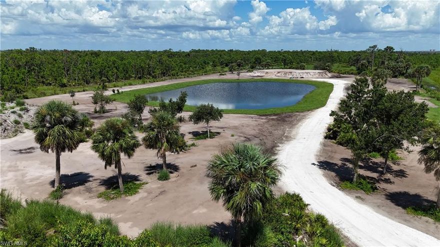 Discover a truly unique property with this 5.43-acre track, a hidden gem nestled at the end of a road and bordered on three sides by Lee County preserve land. This gorgeous property is cleared, fenced and features a fully stocked pond. Dirt is already in place for a house pad and a shop/barn pad. This serene and private slice of heaven offers unmatched tranquility and natural beauty, making it a rare find in today’s market.  Enjoy unparalleled privacy and stunning natural surroundings, all while being just a short drive away from essential amenities. Properties like this are hard to come by—don’t miss your chance to own this exceptional piece of paradise!