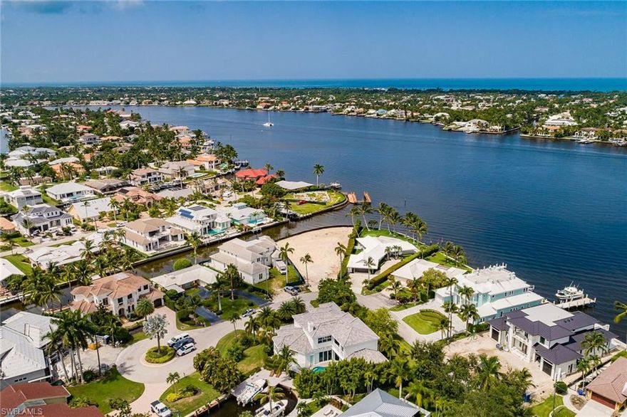 To be built is a magnificent waterfront home on an oversized lot that highlights the fabulous views of Naples Bay. Imagine as you set one foot into this breathtaking 4-bedroom/5-bath home and are already met with long water views. The artistic gourmet kitchen’s top-of-the-line features will make entertaining effortless. The master suite and home office on the main floor allow for relaxed Florida living. All of this is complemented by the stunning contemporary style pool and spa that overlooks Naples Bay. The private elevator to the second floor leads to three additional bedrooms, a bonus room, and a work/study area, all without sacrificing luxury. A spiral staircase to the observation deck allows for an unparalleled vantage point to enjoy famous sunsets in Naples. This property is in the final stages of design and now is the time to make your personalized selections.