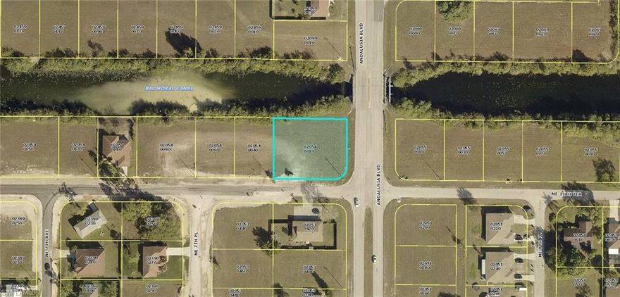 Investment potential! Canal front lot, with city water, sewer and irrigation, MULTI FAMILY ZONING (6 units or less) and located in FLOOD ZONE X (meaning NO FLOOD INSURANCE). This is a HUGE 3 lot parcel (0.425 acres) Area is mostly newer duplexes and newer single family homes, close to Pine Island rd.