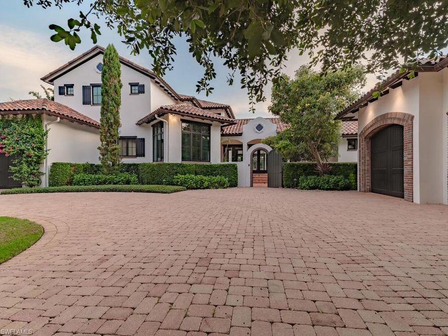 This Spanish Revival masterpiece is situated on a double lot on cul de sac in the Moorings, 1 mile from the beach & 2 miles to Venetian Village/5th Ave restaurant district! A one-of-a-kind Spanish/Moorish inspired courtyard residence showcasing intricate tile, opulent marble/granite, richly stained wood and masterfully choreographed custom lighting, creating an ambiance of understated luxury. Discover graceful arcades, French doors, abundant windows and 13’ gallery halls in 8,000 SF of snowy stucco walls blurring the lines between interior/exterior spaces. Step through the arched entryway garden to the front doors and be captivated by the main gallery and views of the central courtyard with impressive quatrefoil shaped fountain. The gourmet kitchen is open to the dining area and step-down brick-clad bar and great room, separated by the brick archway leading to the expansive screened-in outdoor living. 5 oversized bedrooms with large walk-in closets, 4 full baths, powder room, pool bath, media room, study, a multipurpose laundry room, home automation system, 3-car garage, custom Moorish& Spanish fountains, resort-style pool/spa and built in fire-pit complete this magnificent home.