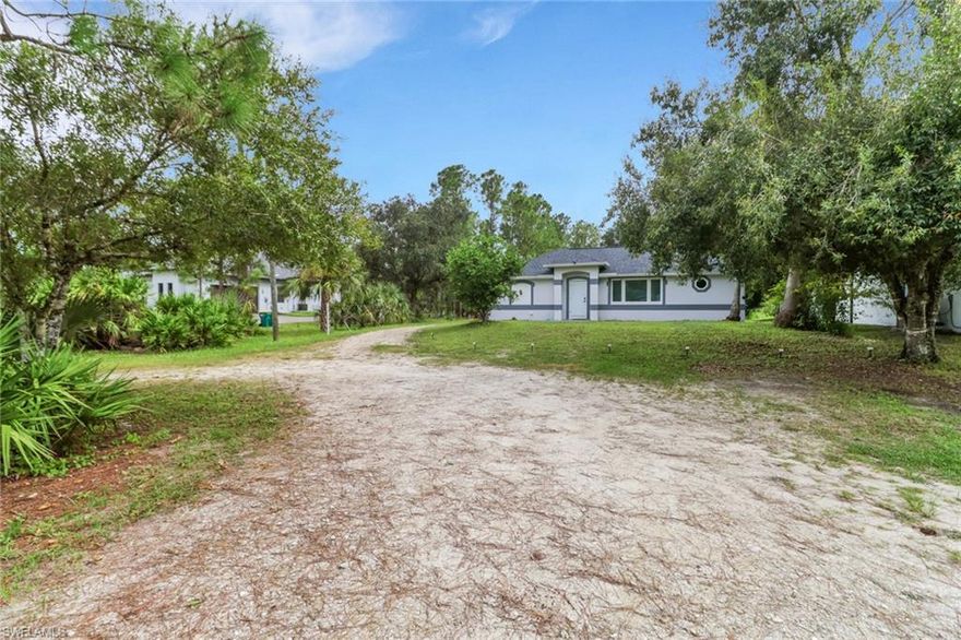 Welcome to this charming single-family home located in the highly desirable Golden Gate Estates area of Naples. Situated on a spacious 1.14-acre 100% upland lot, this property offers the perfect combination of privacy, space, and modern comfort.

This 3-bedroom, 2-bath residence features an open-concept layout filled with natural light, creating a warm and inviting atmosphere throughout. The updated kitchen is designed for both style and functionality, complete with white shaker cabinetry, granite countertops, and stainless steel appliances, perfect for everyday living and entertaining.