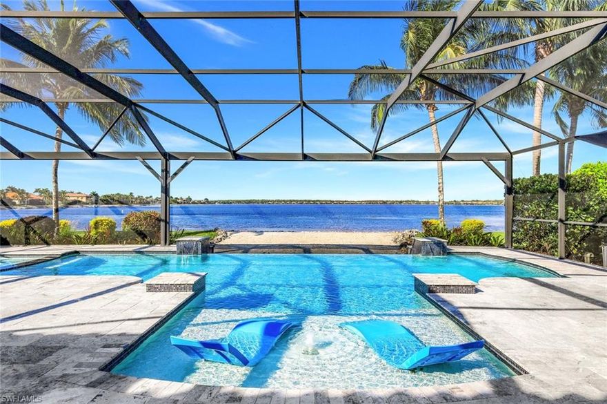 Welcome to your Naples waterfront lifestyle in The Quarry — Located in the EXCLUSIVE gated community of Breakwater Drive close proximity to the  amenity-rich beach club where every day feels like vacation.  This beautifully enhanced Modified Windsor floor plan featuring 5 Bedrooms (4 Ensuites), 4 full baths and a 3 car garage blends resort living with everyday comfort, offering a flexible layout and stunning lake views that make coming home feel like a getaway. Thoughtfully expanded to include a fifth bedroom with ensuite bath and an added den, this home lives large and feels light, bright, and updated throughout. The freshly painted interior (2025), custom light fixtures, and hardwood floors in the primary suite, guest bedroom, and den give a polished coastal feel. A frosted glass barn door adds privacy and style to the guest suites, while custom closet systems and remote-controlled room-darkening blinds provide everyday luxury. The main living area centers around a custom TV feature wall with a built-in fireplace, creating a warm and welcoming space for gatherings. Surround sound in the main living areas and outdoor lanai enhances movie nights for entertaining. The kitchen includes an induction stovetop and a reverse-osmosis water system, blending practicality with modern convenience. Step through the sliders and into your private outdoor oasis. Enjoy a saltwater infinity pool and spa overlooking PANORAMIC views of Stone Lake, framed by a picture-window lanai screen.  A newer outdoor kitchen (2020) makes entertaining easy, while a private beach and deeded boat dock (#5) open the door to boating, kayaking, fishing, water-skiing, or simply watching the sunset over the lake. Behind the beauty, the home is built for lasting comfort and peace of mind with a newer AC handler (2021), whole-house surge-protector (2020), and whole-house generator (2024).
Life at The Quarry is all about lifestyle. This gated, amenity-rich environment is perfect for boating, jet-skiing, and water sports, but it doesn’t stop there. The Beach Club features a resort pool, lap pool, hot tub, tennis, pickleball, and bocce courts, plus a Tiki bar with poolside food and beverage service, a state-of-the-art wellness center, and a full-time activities director who curates social events year-round. Golfers will love the optional golf membership at The Quarry Golf Lodge, which currently offers a limited-time 3-year payment plan for the PGA-level Hurdzan-Fry 18-hole course. Whether you’re a dedicated player or simply love the golf-course lifestyle without the obligation, The Quarry offers the best of both worlds. This move-in-ready waterfront home combines comfort, craftsmanship, and convenience in one of Naples’ most desirable resort communities. It’s a place where you can boat in the morning, golf in the afternoon, and unwind by the pool as the sky glows over the lake — the perfect expression of the Naples lifestyle at The Quarry!