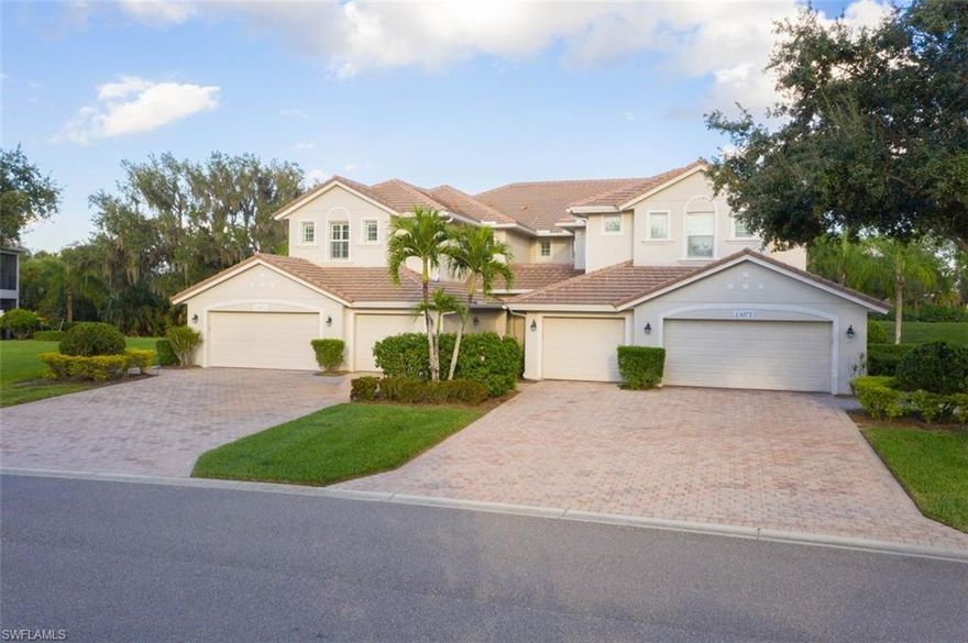 This PRESTINE carriage home is being offered "TURNKEY" and is tastefully decorated with high end furnishings. Featuring 2 bedrooms, 2 full bathrooms and a 3rd bedroom large enough for an office or a TV room....it's huge. There's an open floor plan, an eat-in kitchen, the primary bathroom has a separate tub/shower and there's an attached (freshly painted) one car garage.  From the screened in lanai you'll enjoy gorgeous views of the nature, walking trails and total privacy from your neighbors.  Granite counter tops, plantation shutters,  upgraded wood floors in the bedrooms, fresh interior paint and crown molding are some of the many upgrades.  For your convenience and enjoyment, the Pebblebrook pool, hot tub and fitness room is only steps away from your front door.  This unit has a newer roof, newer HVAV and a new hot water heater.  Verandah has created a wonderful lifestyle with two 18-hole championship golf courses, tennis courts, a state-of-the-art fitness center, a community pool, pickleball, and bocce ball courts....there's even a Doggy Park for man's best friend. For those who love outdoor activities, how about venturing out and KAYAKING on the adjacent ORANGE RIVER, or going for a nice bike ride or walk on the 9+ miles of trails? Verandah is conveniently located to Downtown Ft Myers, the Caloosahatchee River, and both the Ft Myers and Punta Gorda Airports